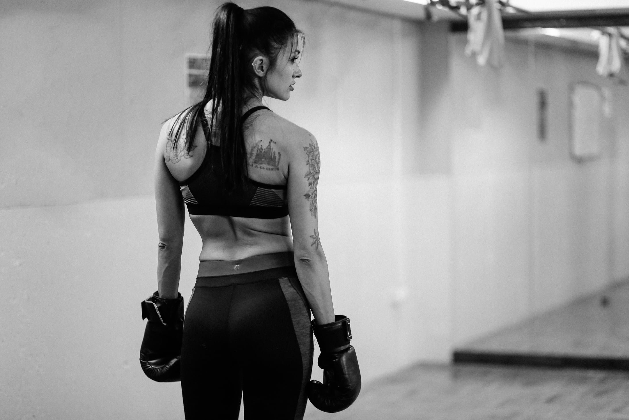 Young woman at her boxing training